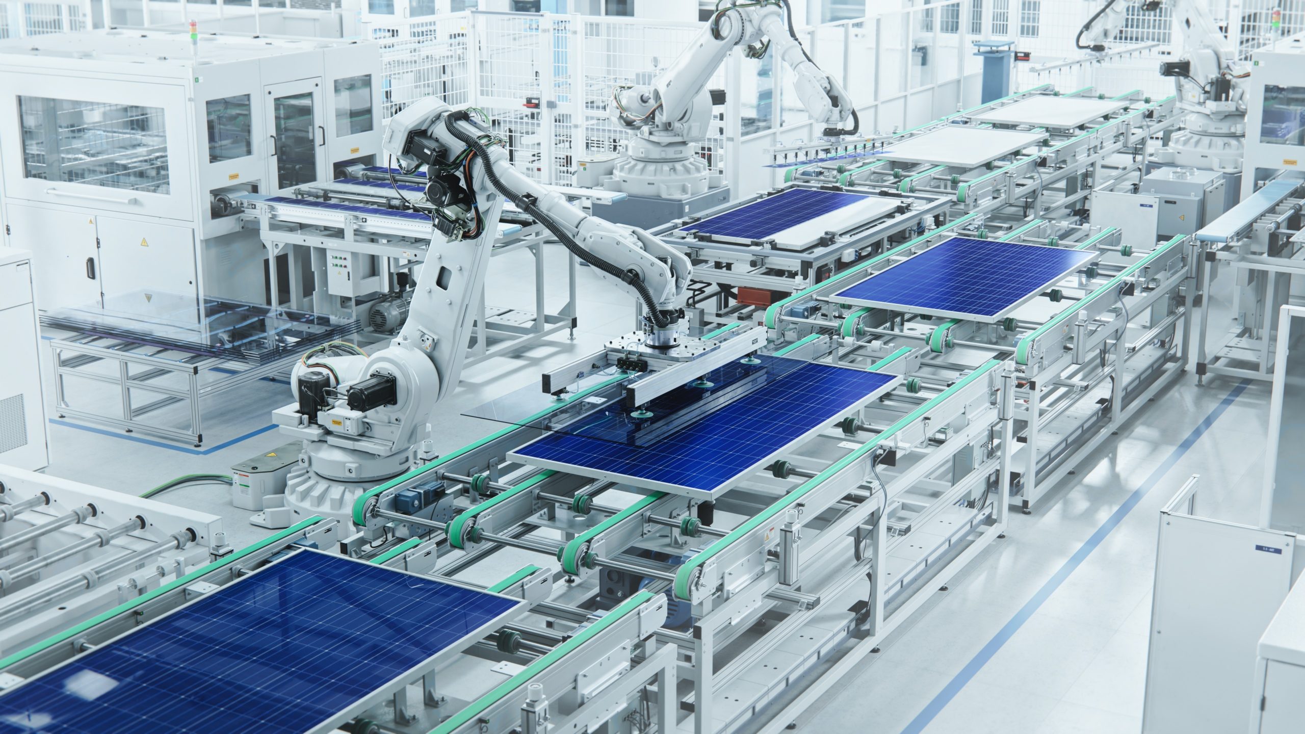Wide,Shot,Of,Solar,Panel,Production,Line,With,Robot,Arms Wide,Shot,Of,Solar,Panel,Production,Line,With,Robot,Arms